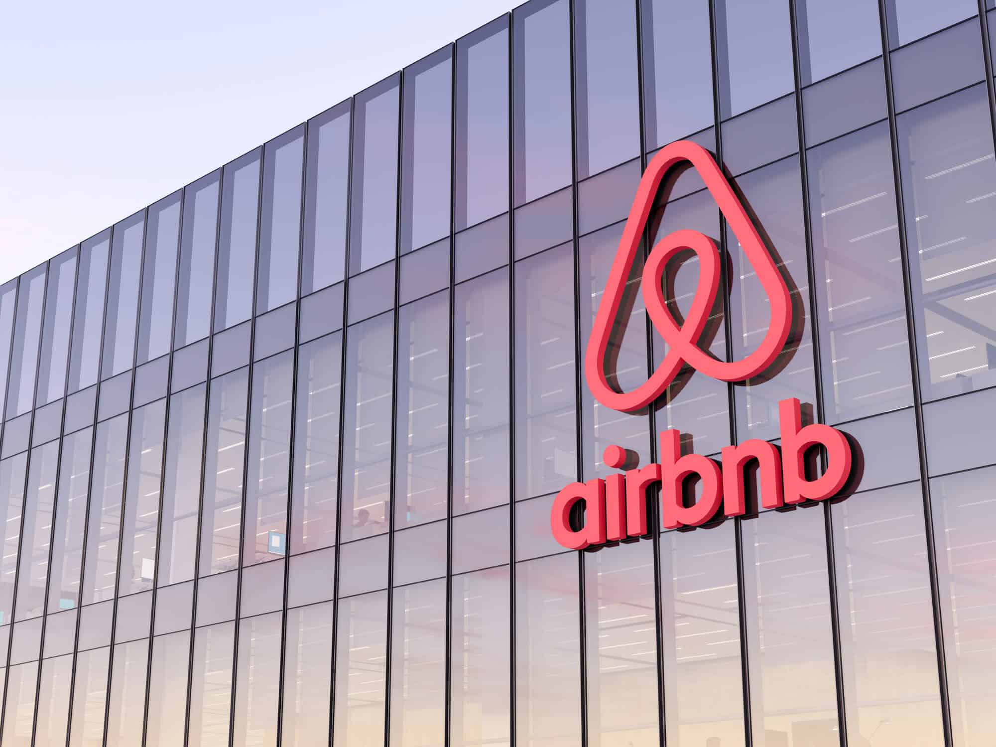 Airbnb employees collaborating in an office setting, representing the cross-functional culture candidates should expect in interviews.