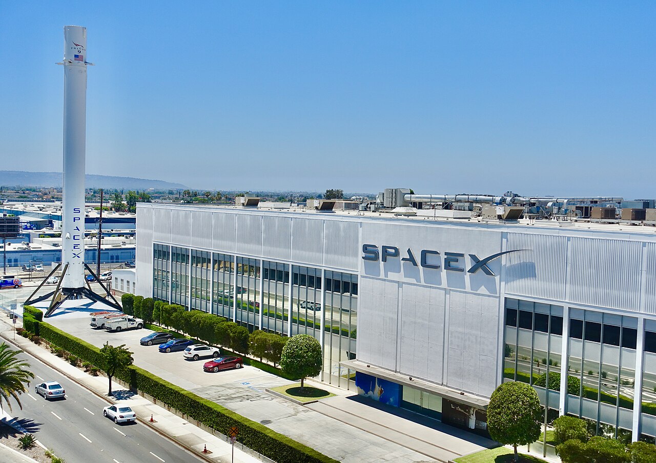 The SpaceX headquarters building in Hawthorne, California, the company's original site and the anchor for Dragon, Falcon, and corporate engineering operations.