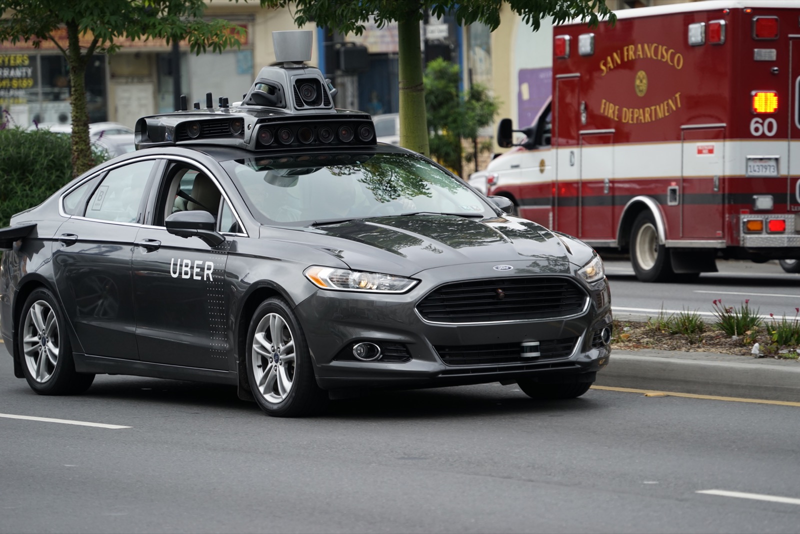 A self-driving Uber prototype on a San Francisco street, representing Uber's long-running autonomous vehicle ambitions.