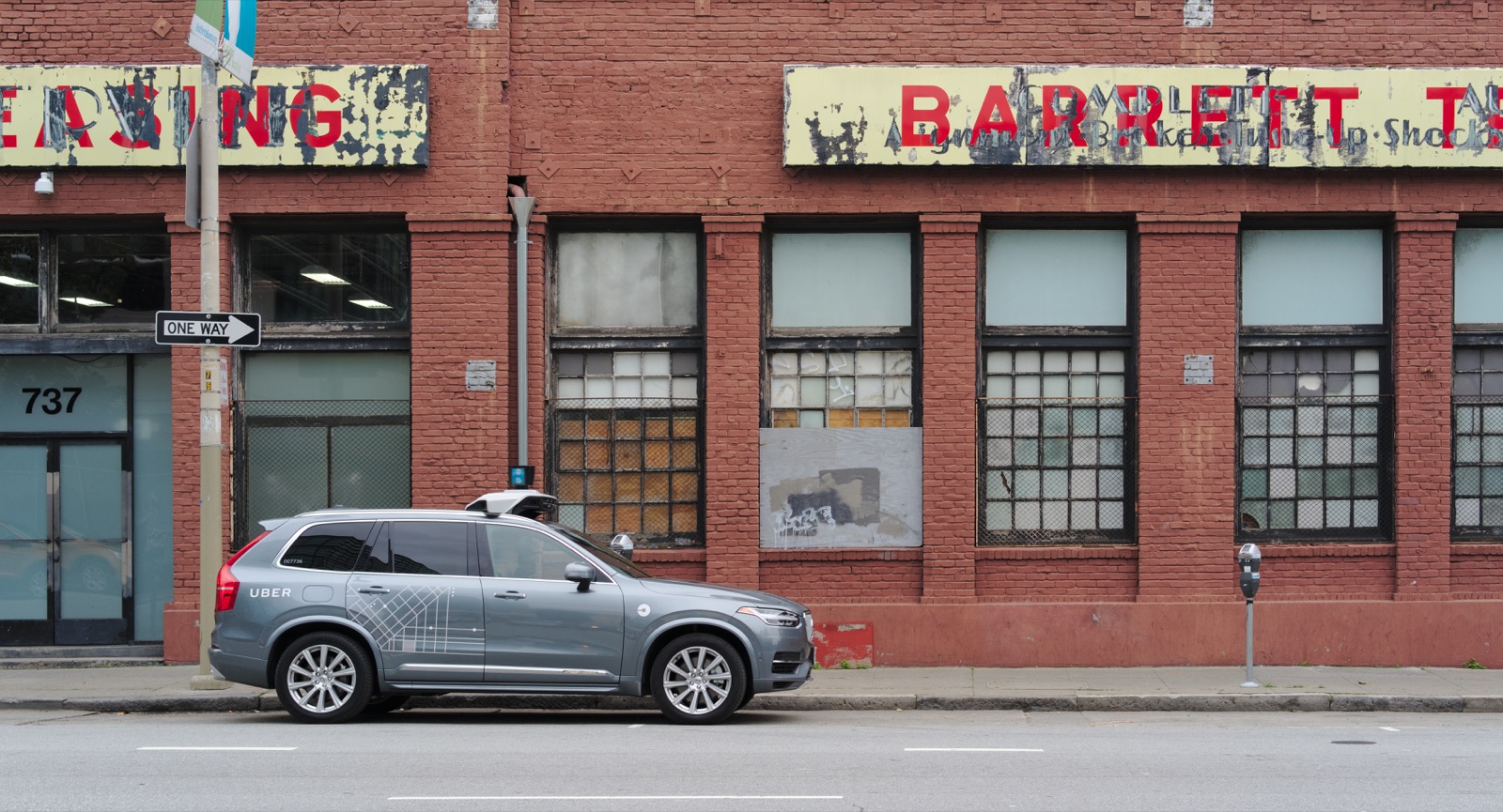 An Uber self-driving Volvo parked outside Otto headquarters, representing Uber's autonomous vehicle and mobility engineering work.