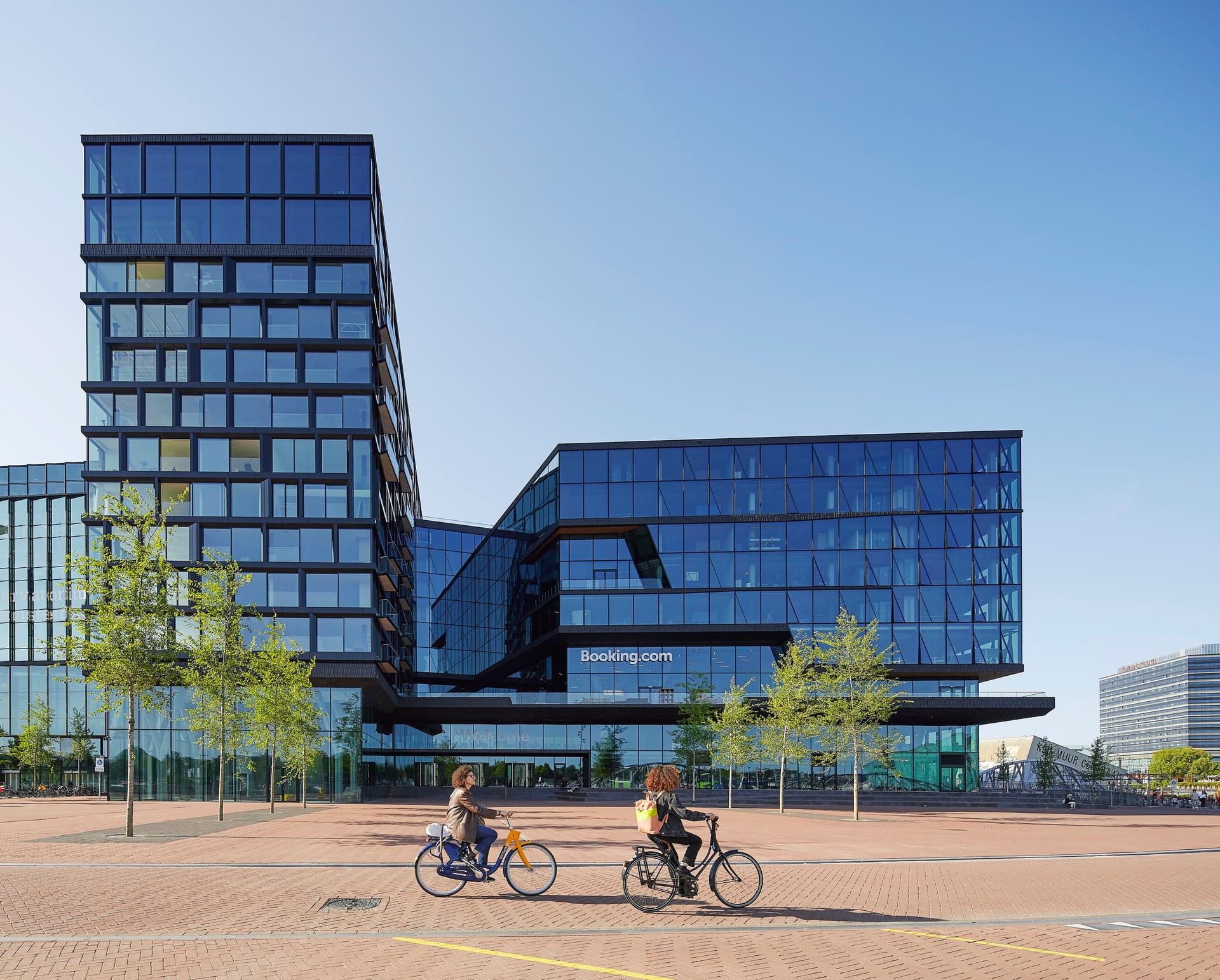 Booking.com headquarters on Oosterdokseiland in Amsterdam, a major anchor of the city's EMEA tech hiring market.